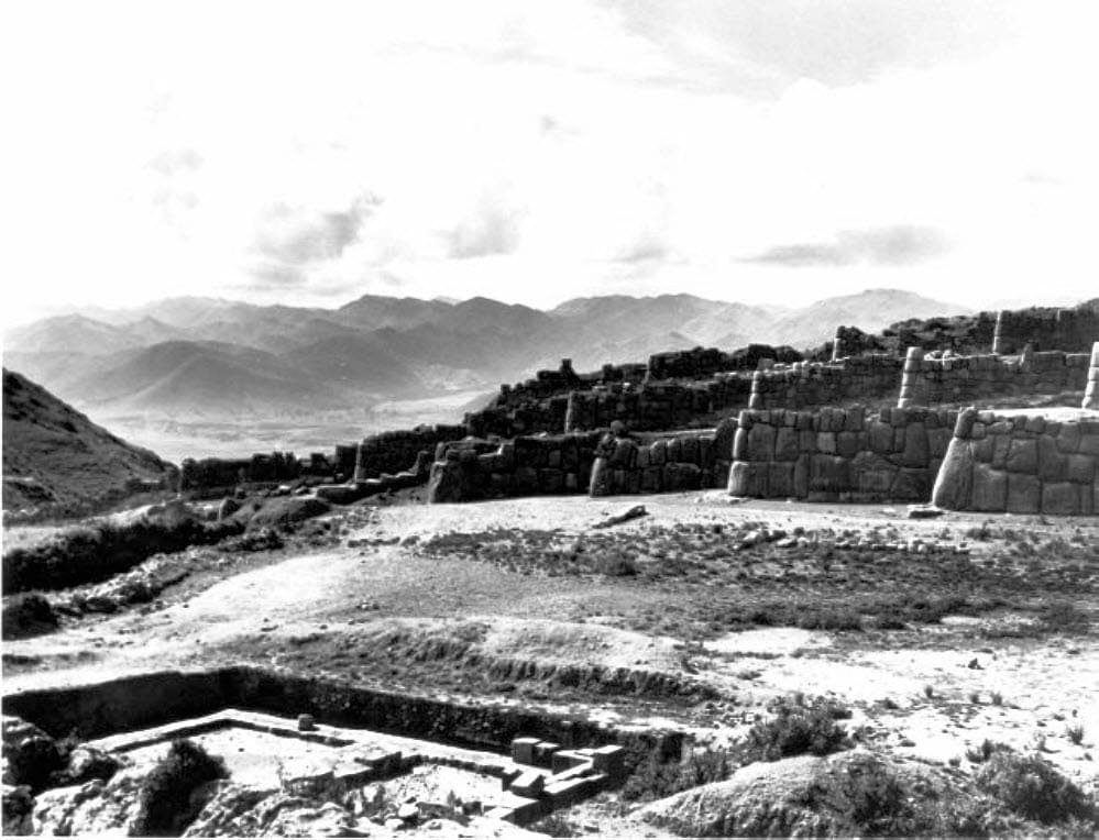 Sacsayhuaman, cerca 1950 U.S. Library of Congress photo. Notice the excavated foundation structure in front of the outer terrace walls? There is today a expanse of a flat, grassed area, called the Esplanade.