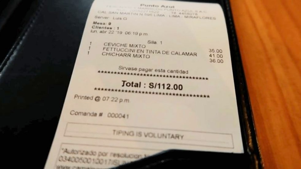 The check at a popular Ceviche restaurant in Miraflores in Peru's capital, Lima, notes that "Tipping is voluntary"