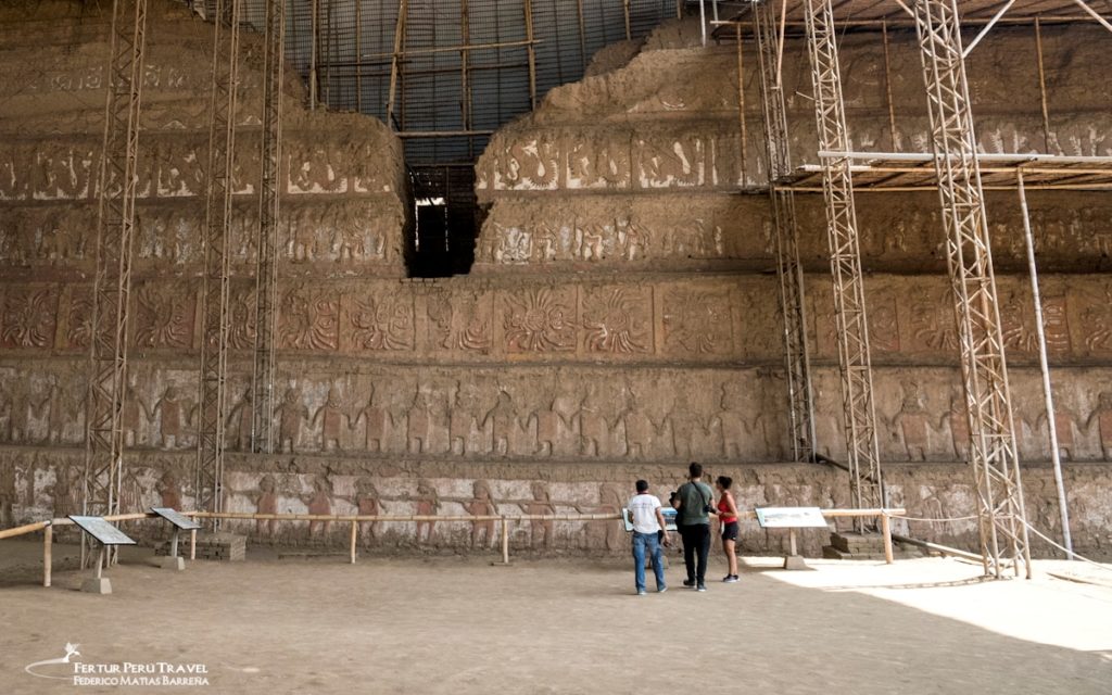 Visitors tour the sacrificial plaza of the Huaca de La Luna in Trujillo, Peru