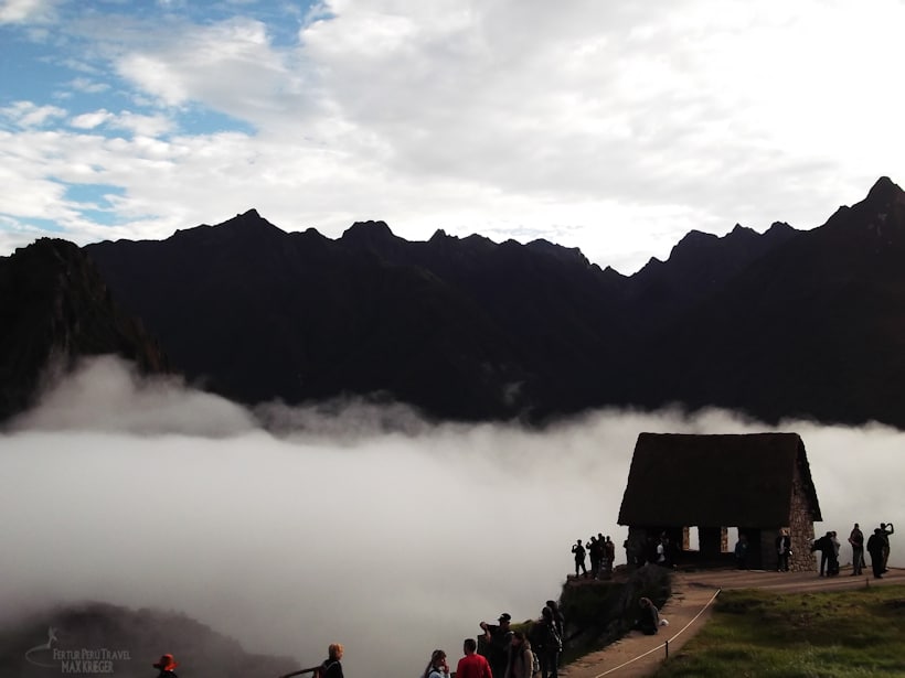 Machu Picchu Guardhouse shrouded in mist just after dawn