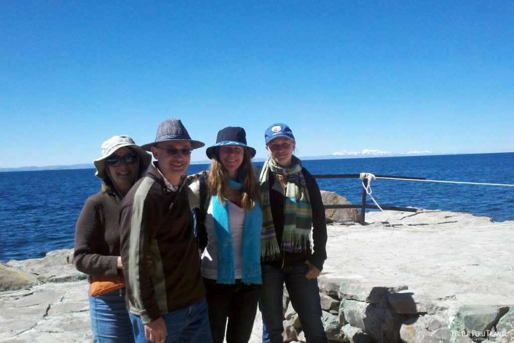 Family on vacation in Peru enjoying Lake Titicaca